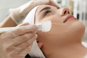beauty lady doing deep cleaning facial treatment