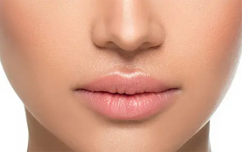 Discover fuller lips through precision lip filler treatments
